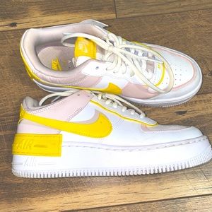 Light pink and yello Nike Air Force 1
